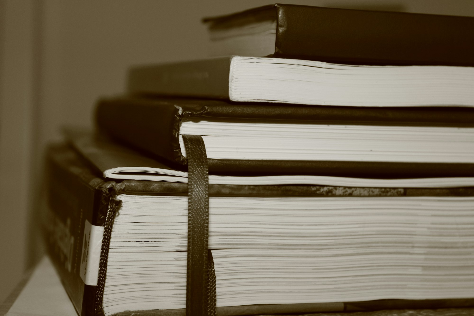 A stack of books on a surface
