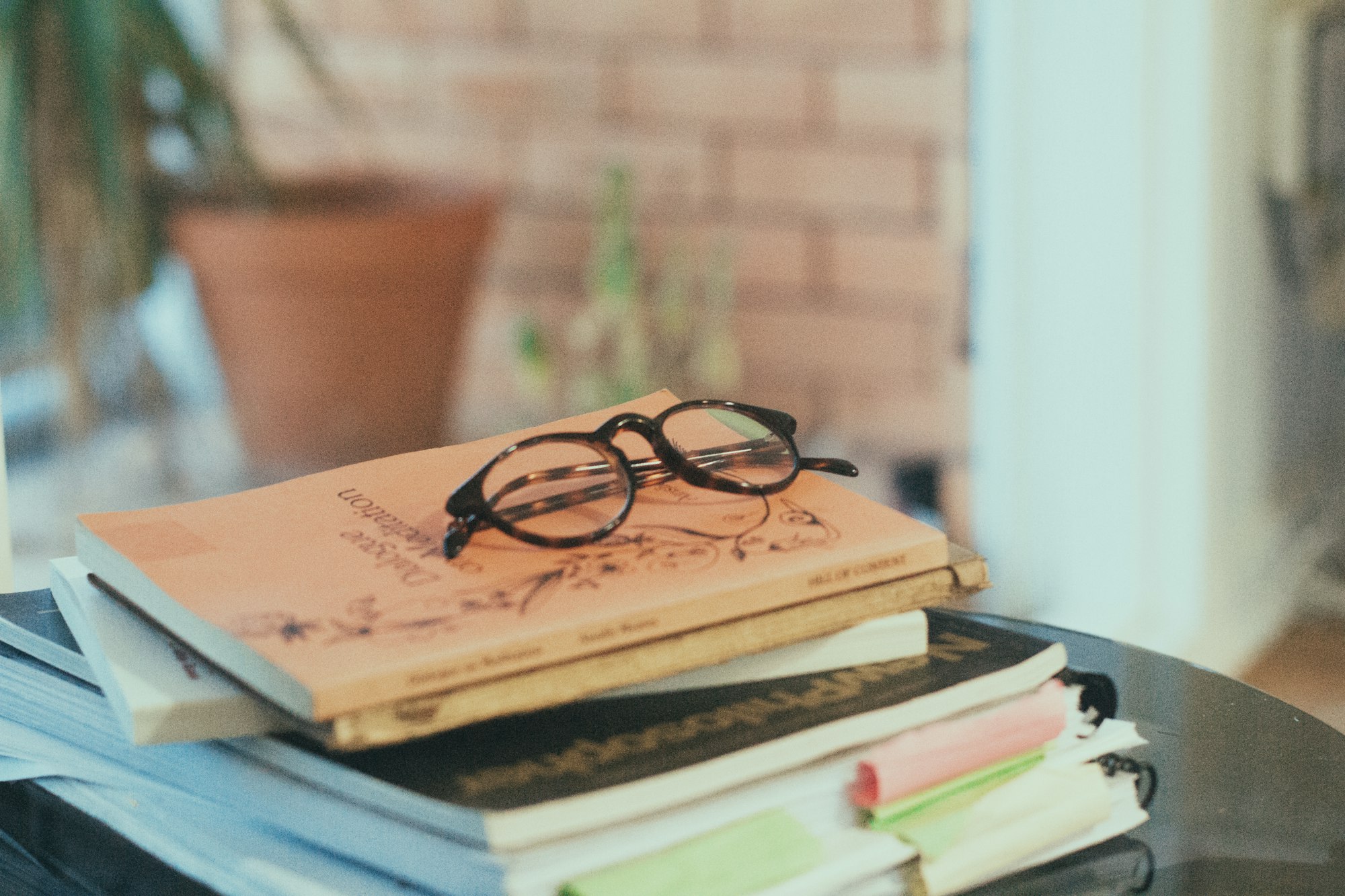 A pile of books on a table