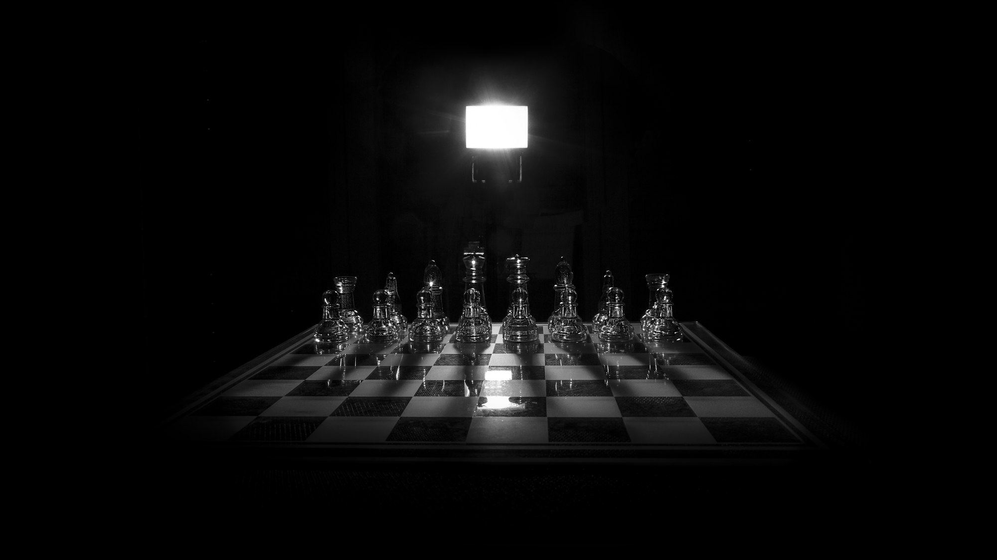 Clear glass candle holder on a table