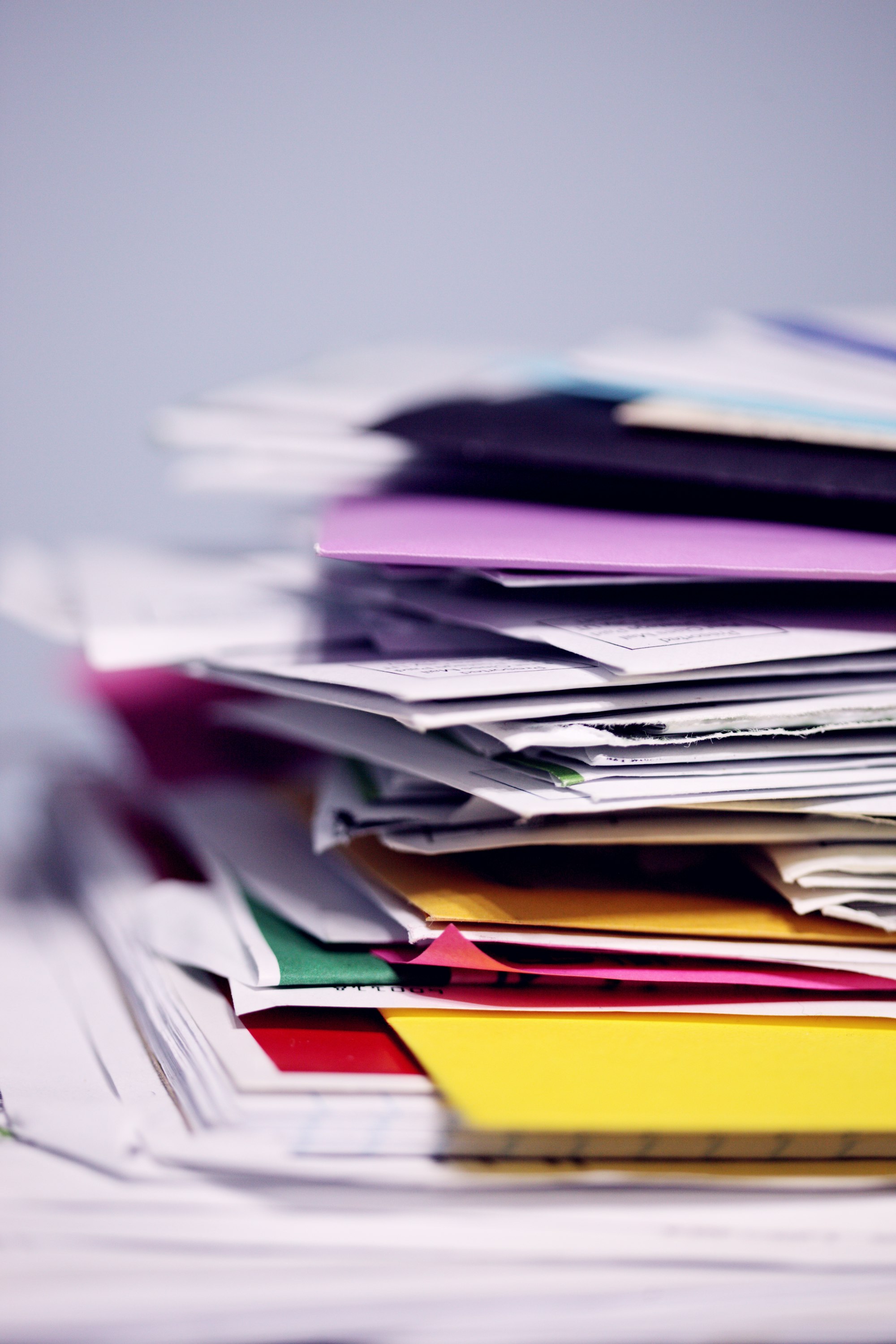 A messy pile of printed papers