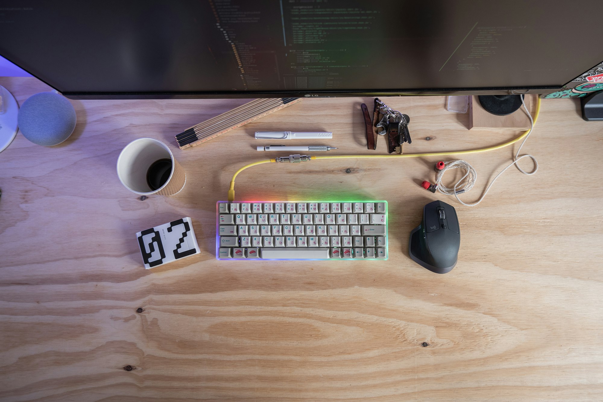 White computer keyboard beside mouse on a desk