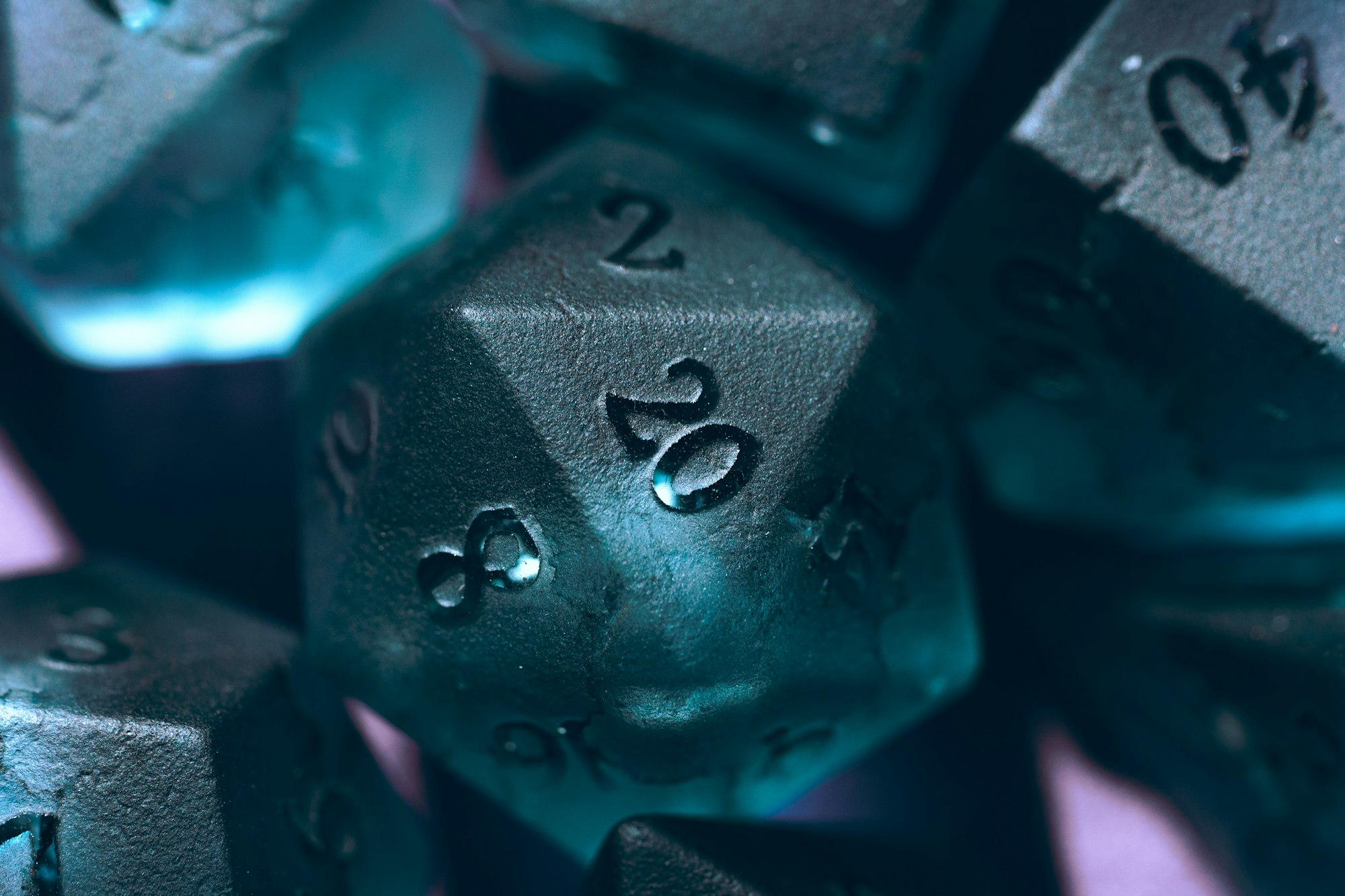 A close-up of a metal dice with numbers
