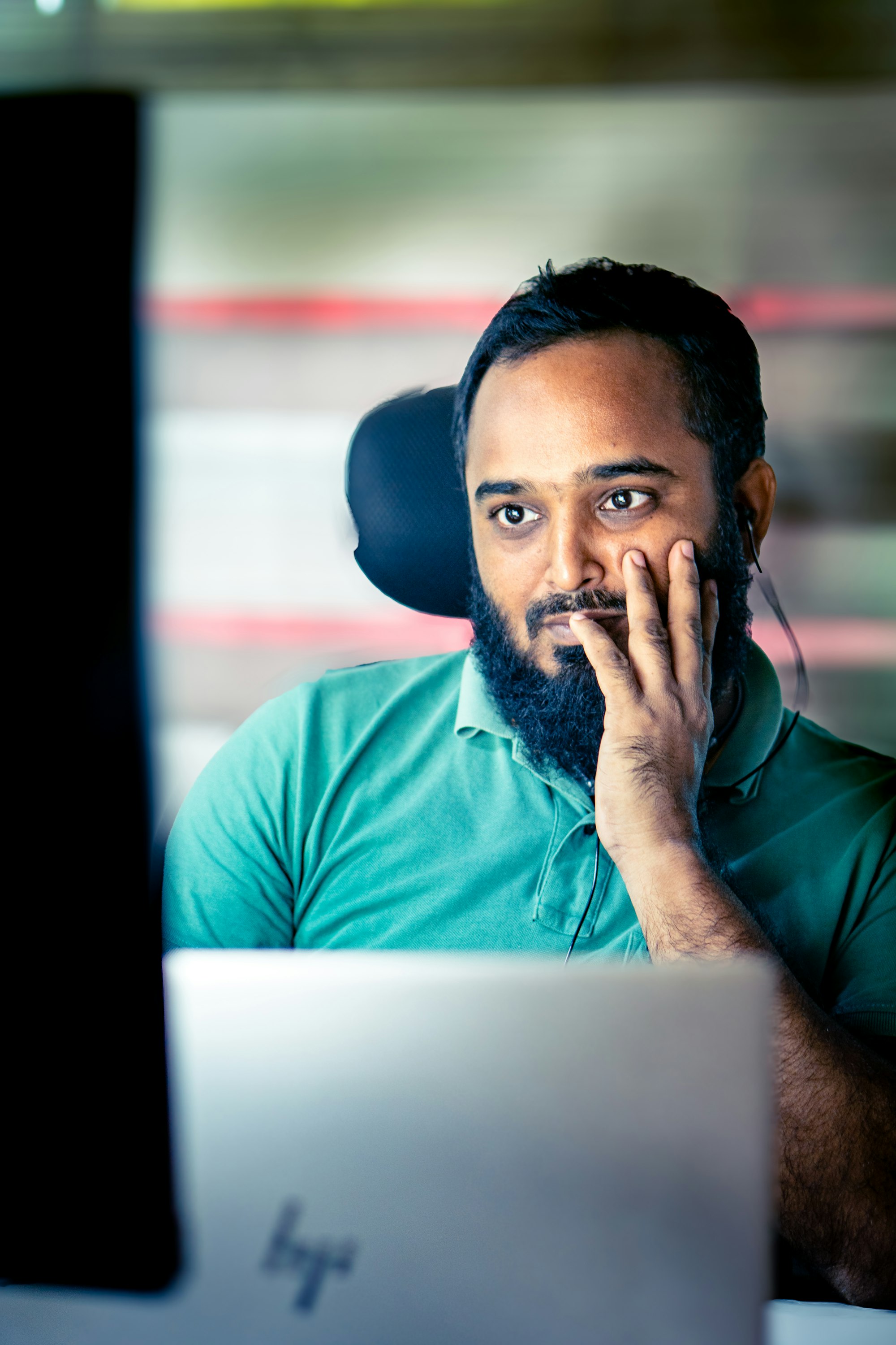 Man looking intently at a computer screen
