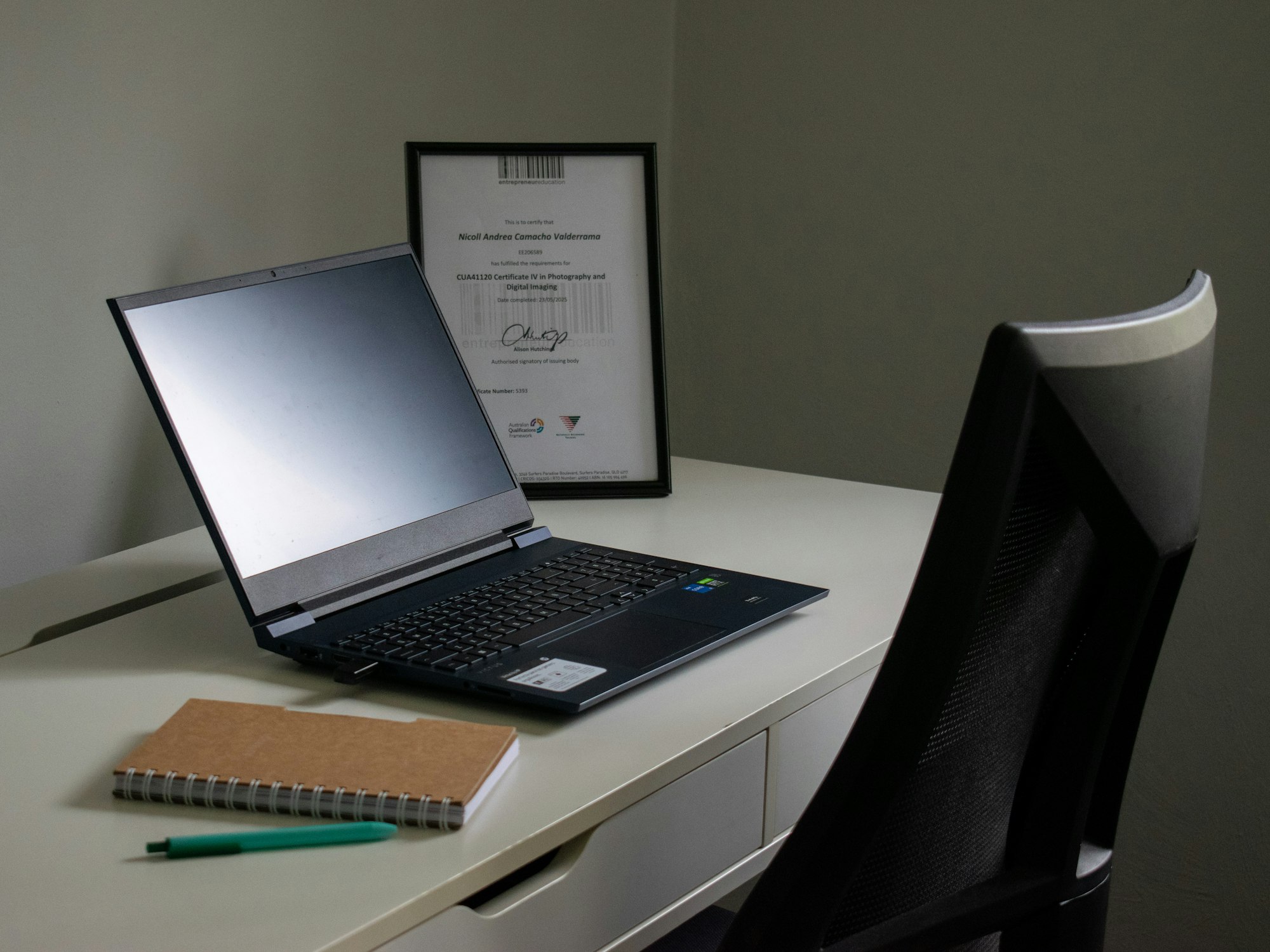 Person focused on learning, surrounded by study materials and practice notes