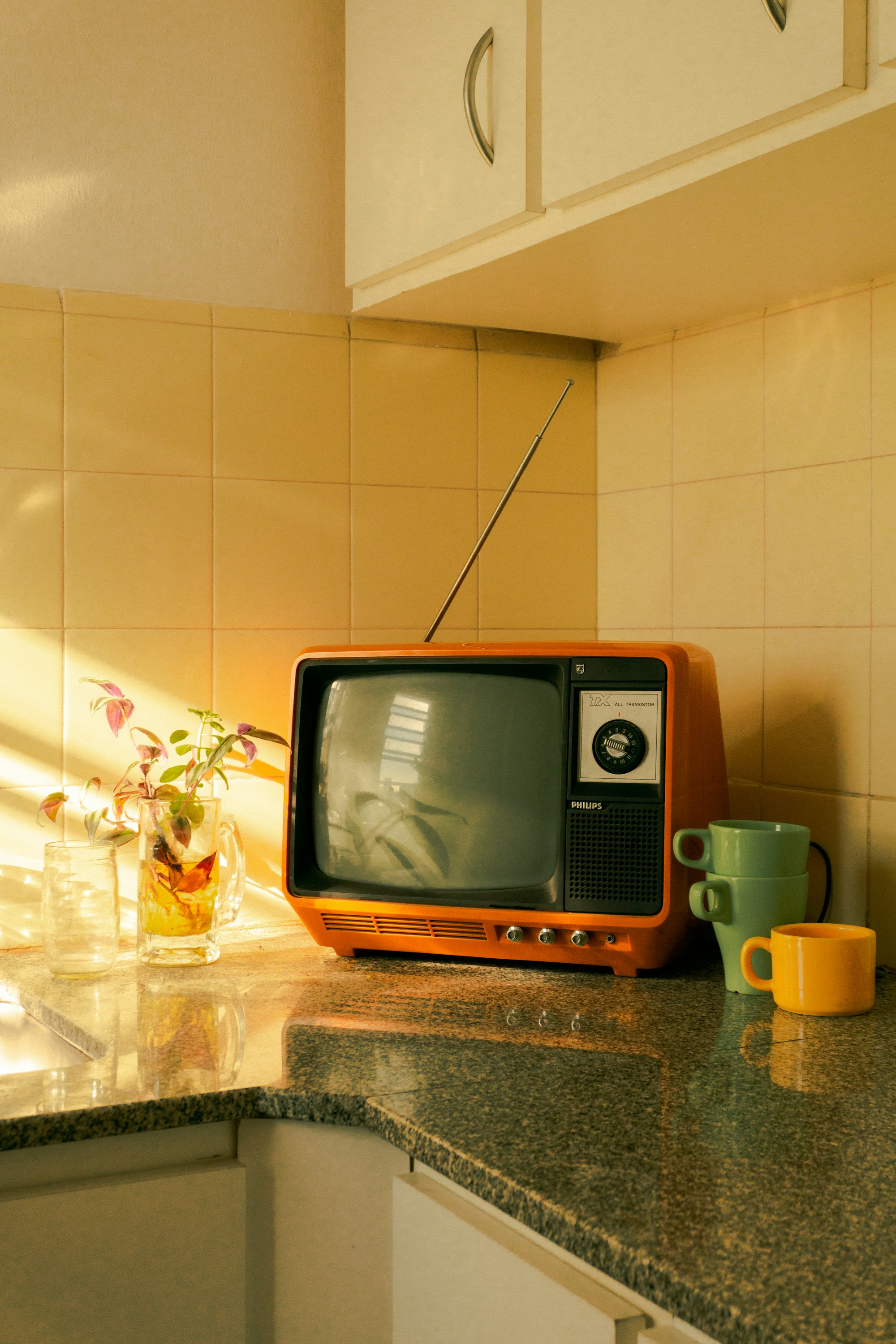 A vintage CRT television on a wooden table