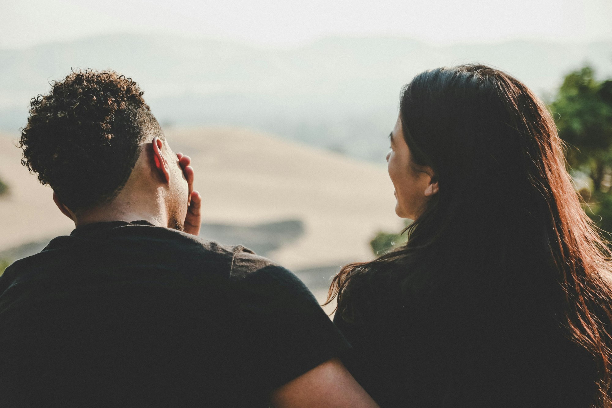 Couple wears black shirt