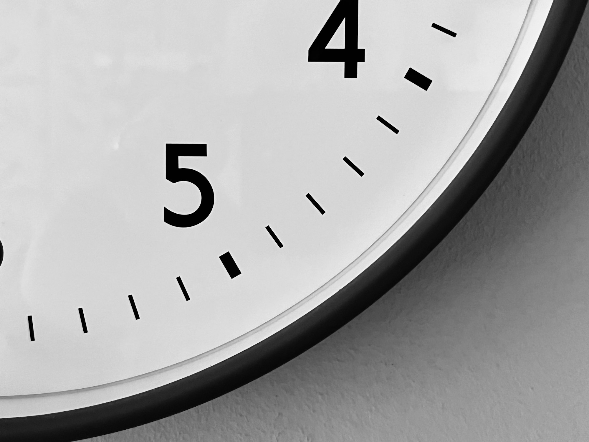 A close up of a clock on a wall