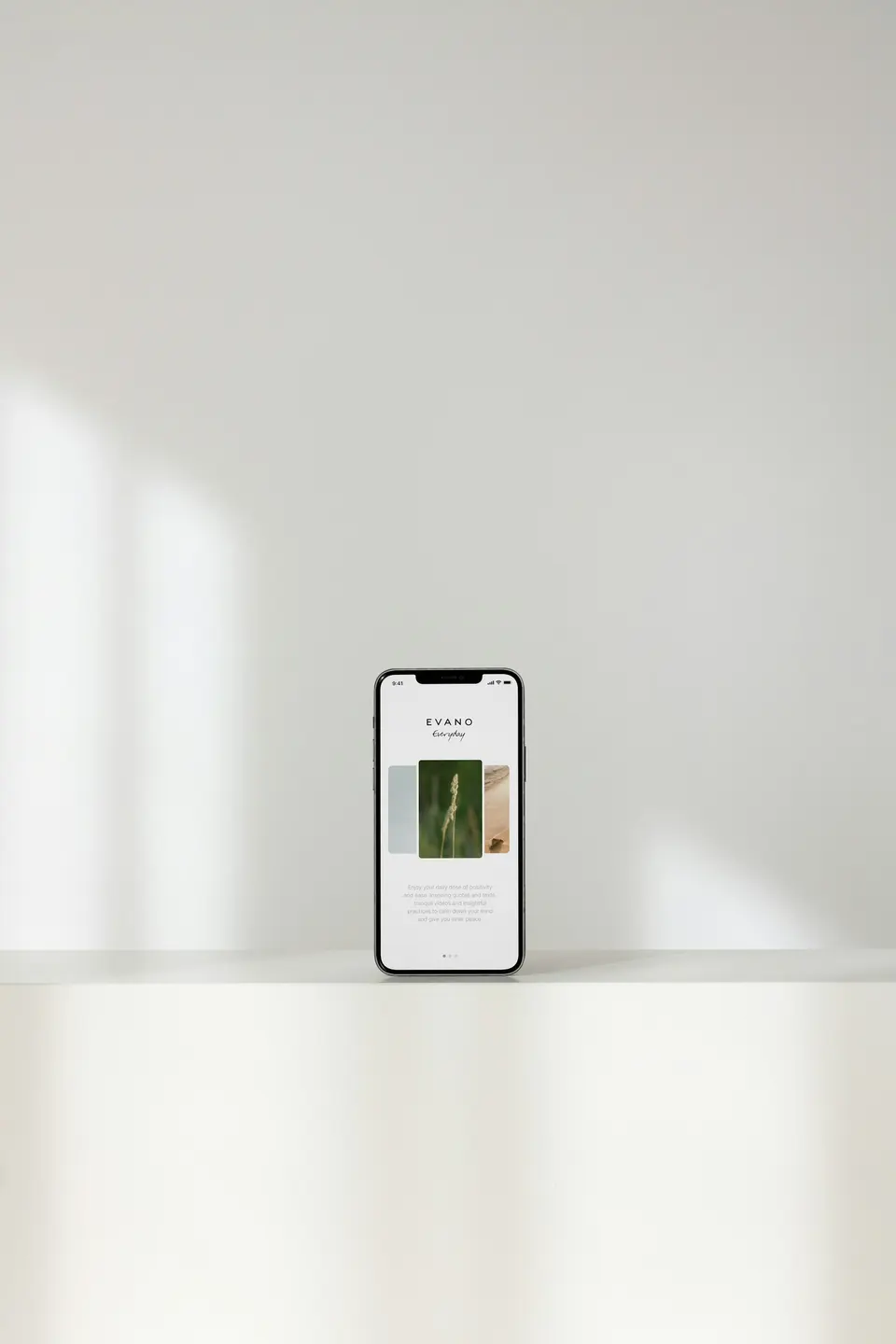 Silver iPhone on white table