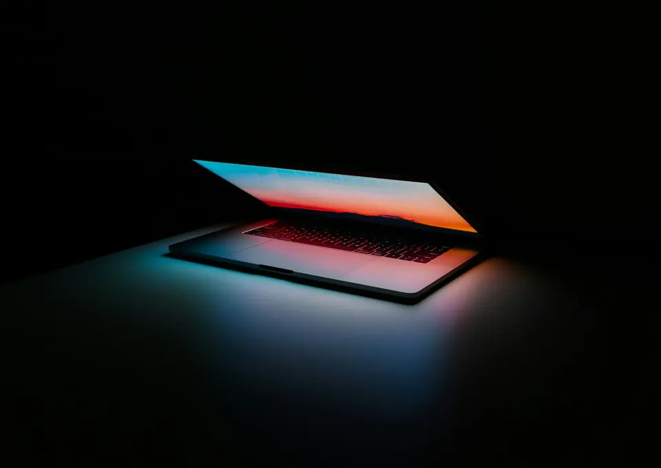 Gray and black laptop computer on surface