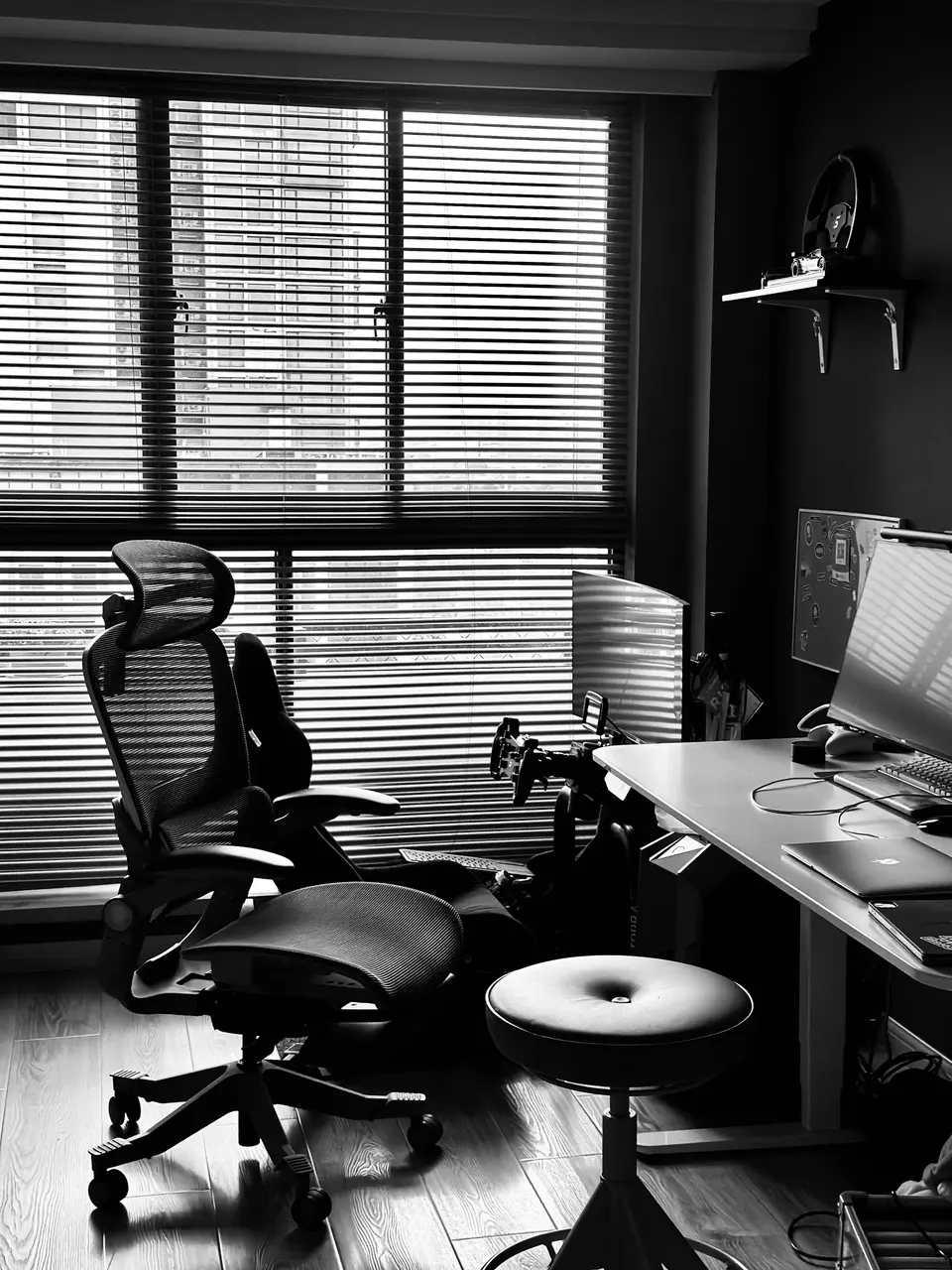 Ergonomic chair and desk setup with computer.