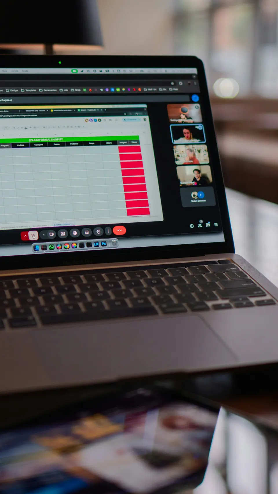A laptop displaying a spreadsheet during a video call